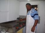 Trevor making Pauls burger