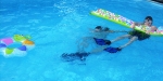 Erin and Liam in the pool