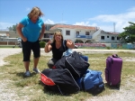 Heather and Cathy with donations and luggage