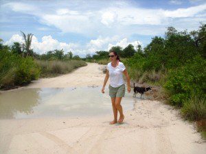 Cindy and Molly checkign out puddles to see if they were drivable Ambergris Caye Belize
