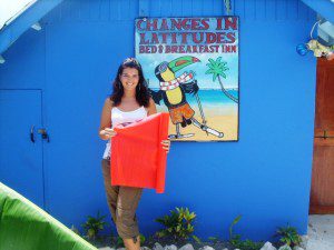Marije holding her red catwalk carpet Changes in Latitudes Belize bed and breakfast