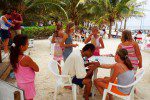 30 Mike doing tattoos for the kids Caribbean Villas beach Resort Ambergris Caye Belize