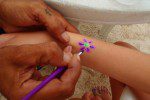 32 Purple flower tattoo Caribbean Villas beach Resort Ambergris Caye Belize