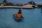 P2071195.jpg - How low can you go? Public Pool Ambergris Caye