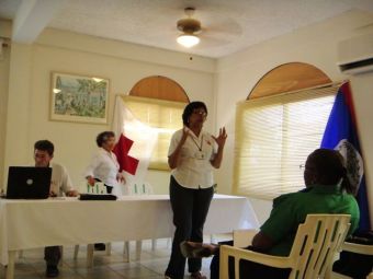 Director General Lily Boman giving her presentation belize red cross san pedro branch